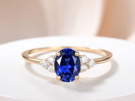 Yellow Gold Lab Created Sapphire Three Stone Moissanite Ring with 6x8mm Blue Oval Lab Sapphire Fashion